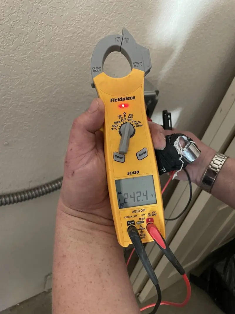 Voltage testing with clamp meter during Generator Installation in Libertyville